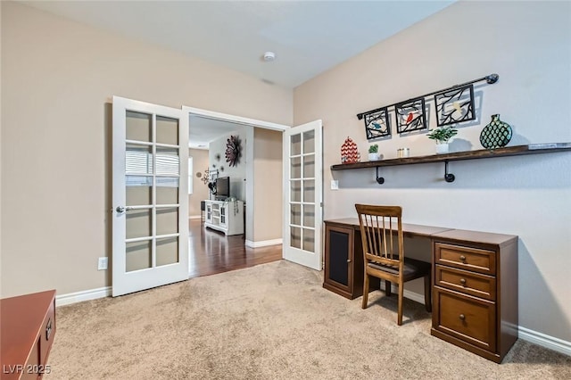 office featuring carpet floors, french doors, and baseboards