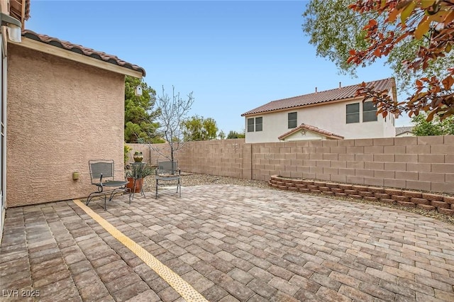 view of patio with a fenced backyard