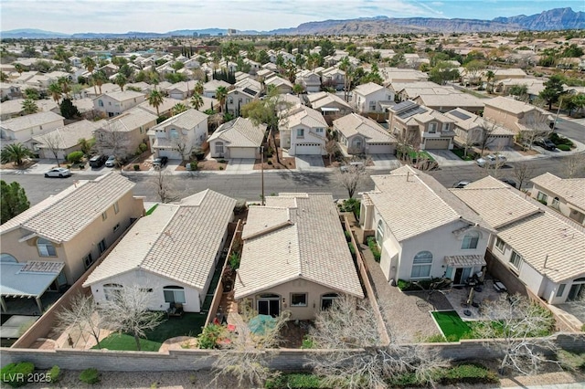 bird's eye view featuring a residential view and a mountain view