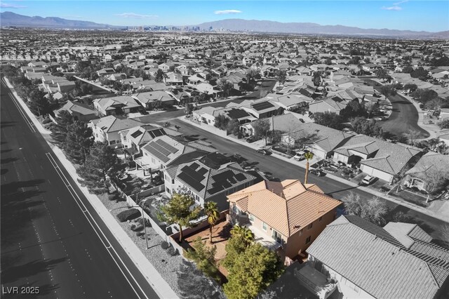 bird's eye view featuring a mountain view and a residential view