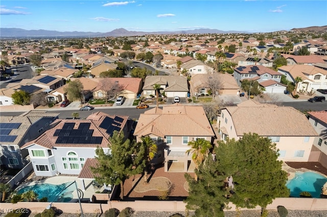 birds eye view of property with a residential view