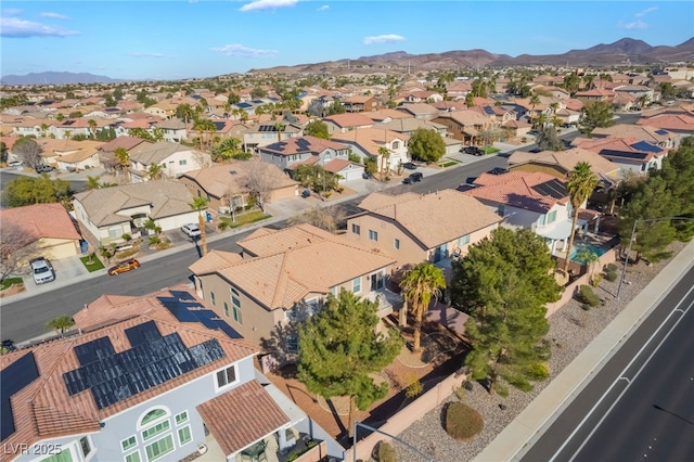 birds eye view of property featuring a residential view and a mountain view