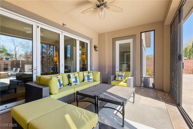 view of patio / terrace with ceiling fan and outdoor lounge area