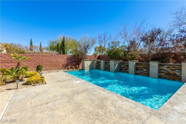 view of swimming pool with fence, a fenced in pool, and a patio