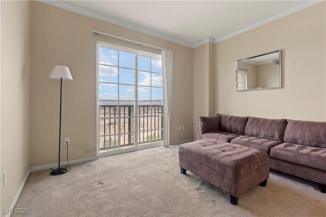 living area featuring baseboards, carpet floors, ornamental molding, and a healthy amount of sunlight