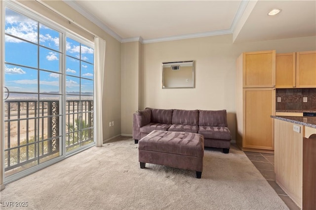 tiled living room with recessed lighting, baseboards, crown molding, and carpet flooring