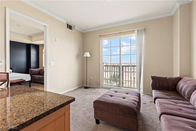 living area featuring light carpet, baseboards, visible vents, and crown molding