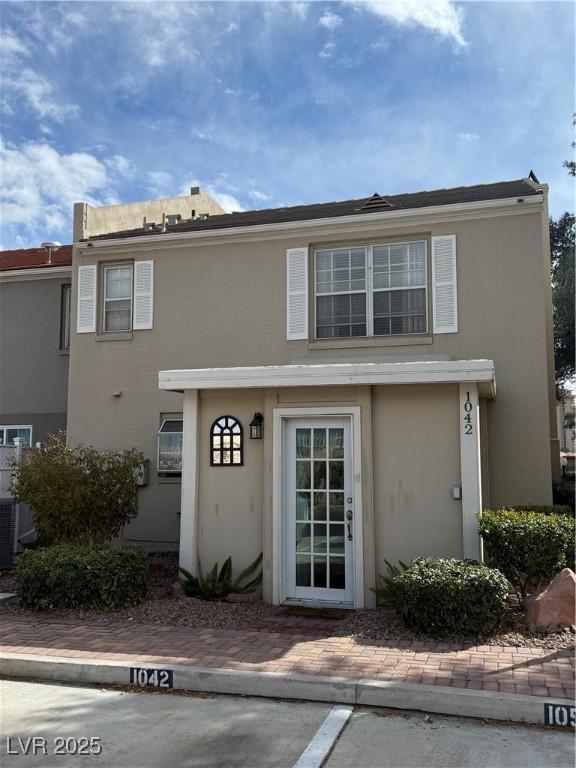 multi unit property featuring stucco siding