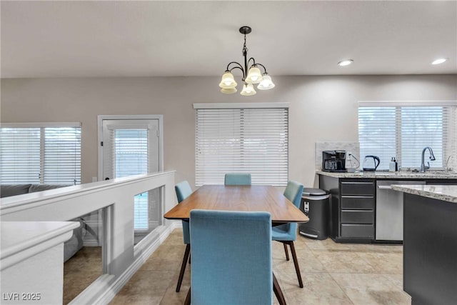 dining area featuring a chandelier and recessed lighting