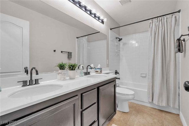 bathroom featuring a sink, shower / bathtub combination with curtain, toilet, and double vanity