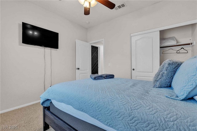 bedroom with a ceiling fan, baseboards, visible vents, and carpet flooring