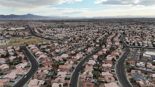 aerial view featuring a mountain view and a residential view