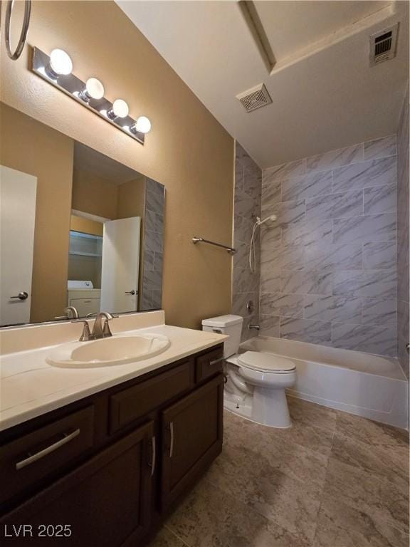 bathroom with washtub / shower combination, toilet, vanity, and visible vents