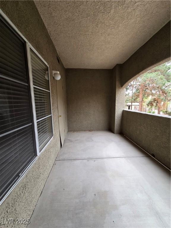 view of patio / terrace with a balcony