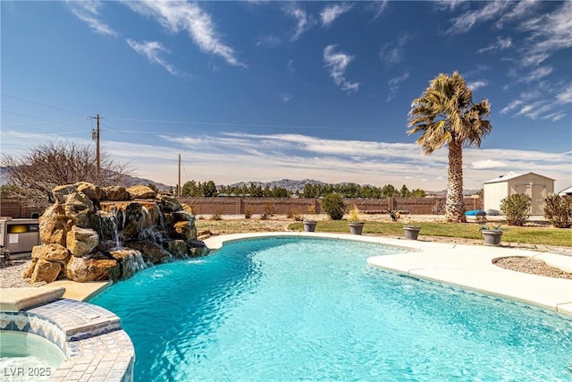 view of pool with a fenced in pool and a fenced backyard