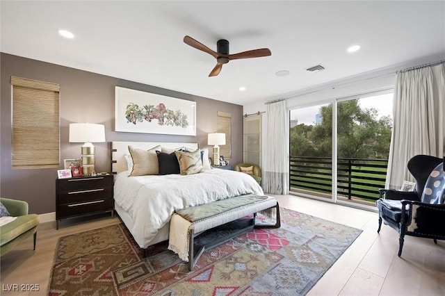 bedroom featuring access to exterior, recessed lighting, visible vents, and wood finished floors