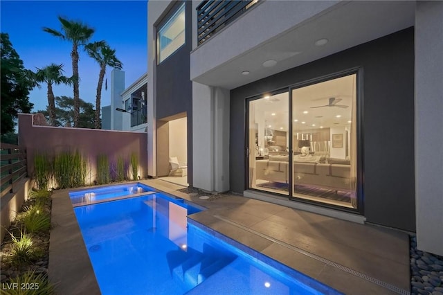 view of pool featuring a fenced in pool, a patio area, and fence