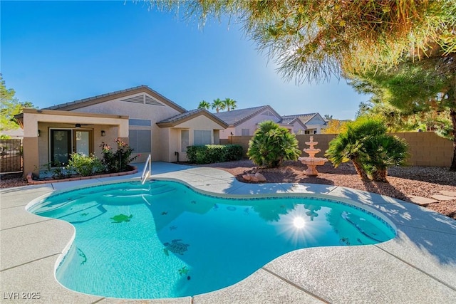 view of swimming pool featuring a fenced backyard, a fenced in pool, and a patio