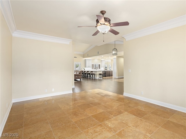 spare room featuring ceiling fan, baseboards, lofted ceiling, and ornamental molding