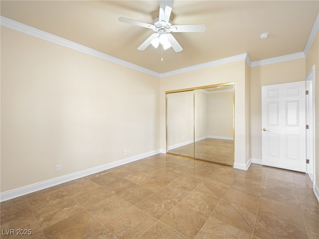 unfurnished bedroom with a closet, a ceiling fan, baseboards, and ornamental molding