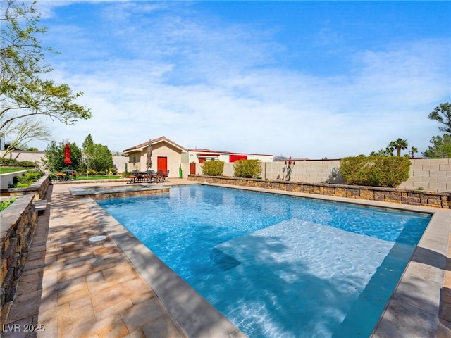 view of pool with a fenced in pool, a patio, and a fenced backyard