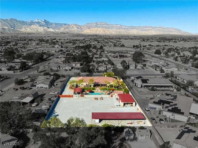 bird's eye view featuring a mountain view and a residential view