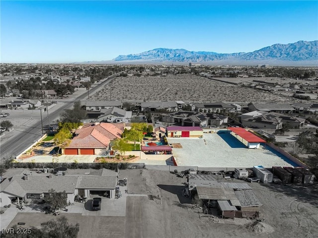 aerial view featuring a mountain view and a residential view