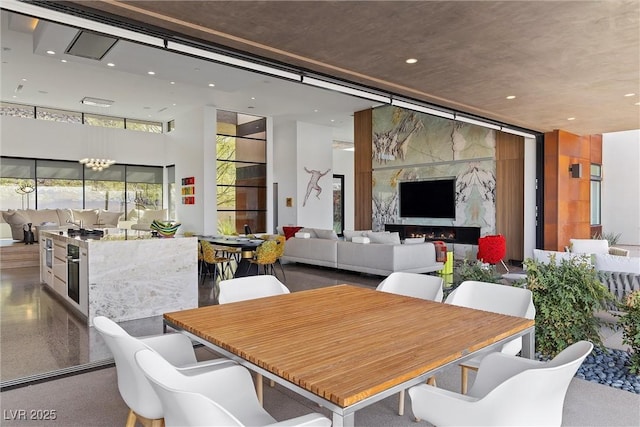 11 Cloud Chaser Blvd, Henderson, NV 89012 - dining space featuring a notable chandelier and recessed lighting