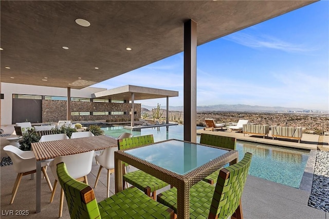 11 Cloud Chaser Blvd, Henderson, NV 89012 - exterior space with a mountain view, a patio, and outdoor dining space
