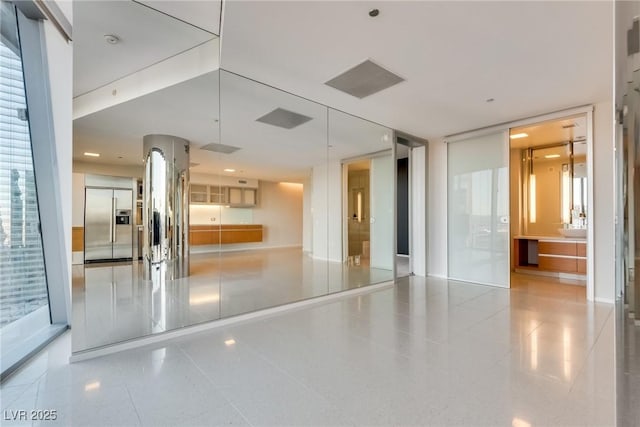 empty room featuring tile patterned floors