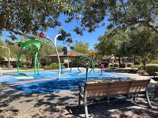 view of home's community featuring playground community