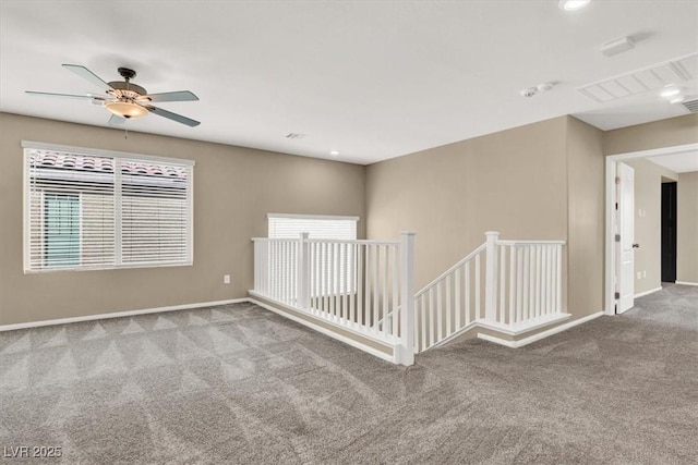 spare room featuring carpet, baseboards, ceiling fan, and recessed lighting