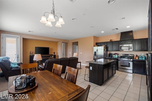 dining space featuring recessed lighting, light tile patterned flooring, visible vents, and an inviting chandelier