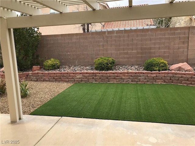 view of yard with a fenced backyard and a pergola