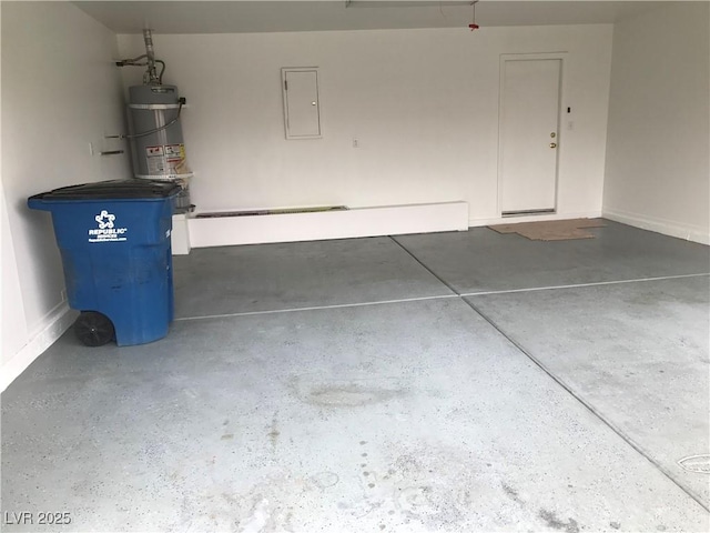 garage featuring secured water heater and electric panel