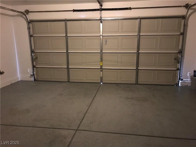 garage with baseboards