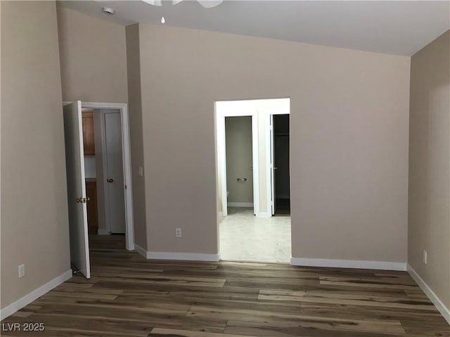 331 Mount Hope St, Henderson, NV 89014 - spare room featuring wood finished floors and lofted ceiling
