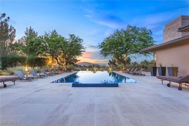 pool with a patio