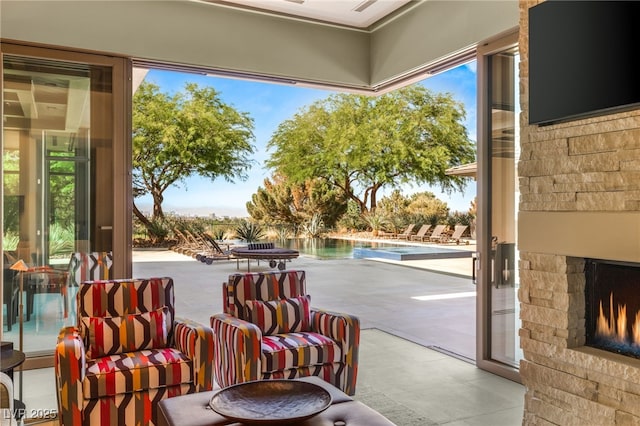 exterior space featuring an outdoor stone fireplace