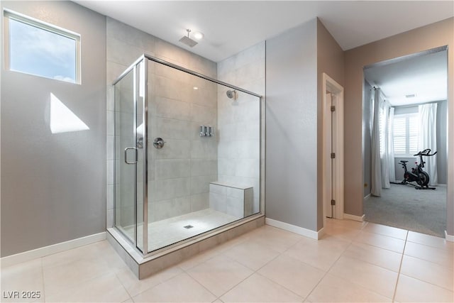 full bathroom featuring baseboards, a shower stall, visible vents, and tile patterned floors