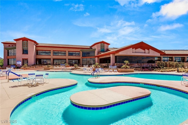 pool featuring a patio