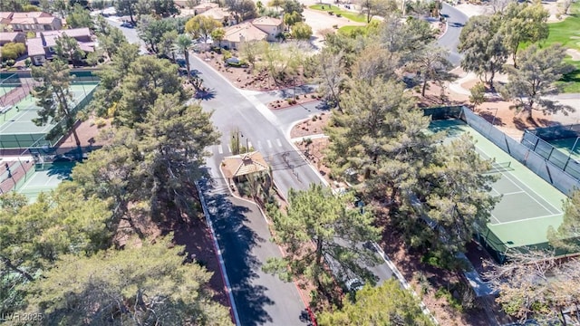 birds eye view of property with a residential view