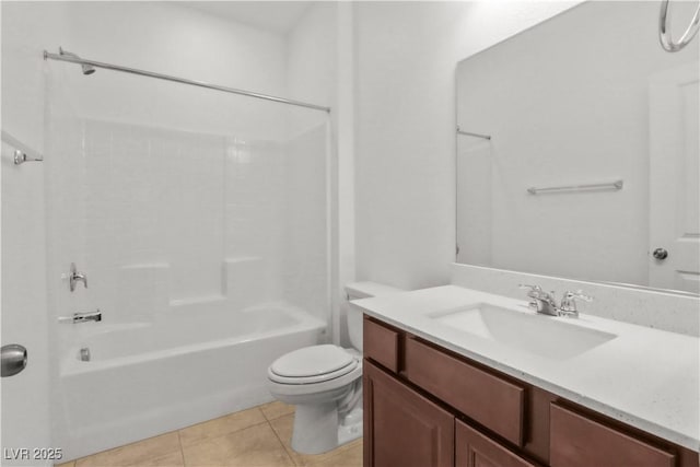 bathroom featuring washtub / shower combination, vanity, tile patterned flooring, and toilet