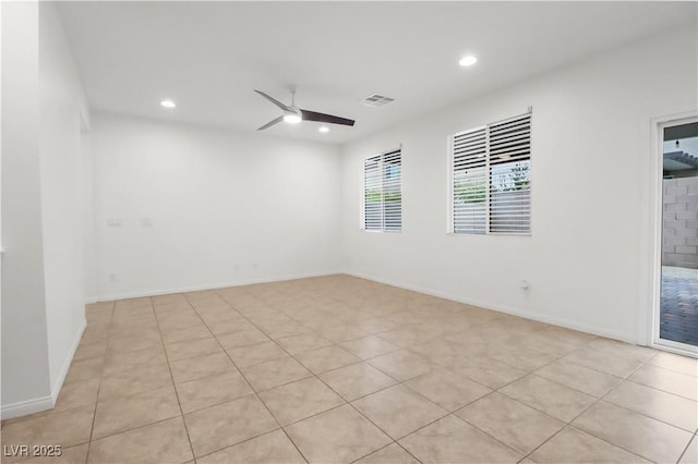 unfurnished room with recessed lighting, visible vents, ceiling fan, and baseboards