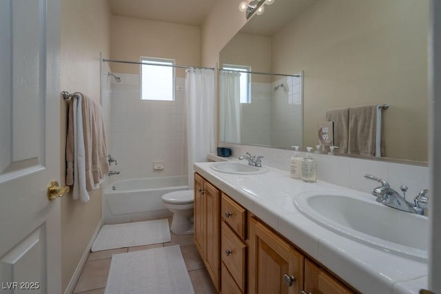 full bath featuring double vanity, shower / tub combo, a sink, and tile patterned floors