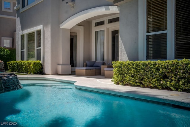 pool featuring a patio