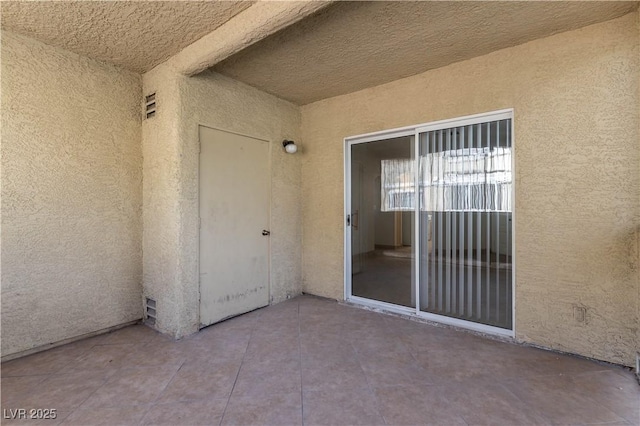 1560 Jamielinn Ln Unit 101, Las Vegas, NV 89110 - doorway to property with a patio and stucco siding