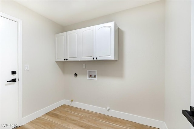 laundry area featuring baseboards, light wood-style floors, gas dryer hookup, and washer hookup