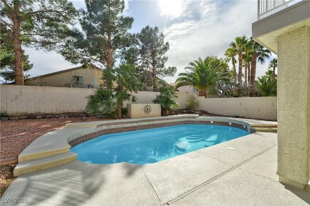 view of pool with a patio area, a fenced backyard, and a fenced in pool