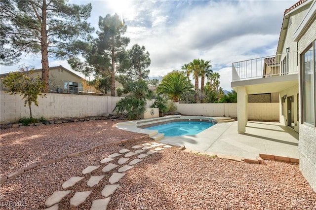 view of swimming pool featuring a fenced backyard, a fenced in pool, and a patio